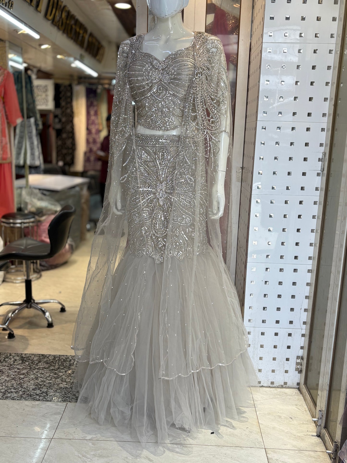 Fishcut lehanga choli with designer cape